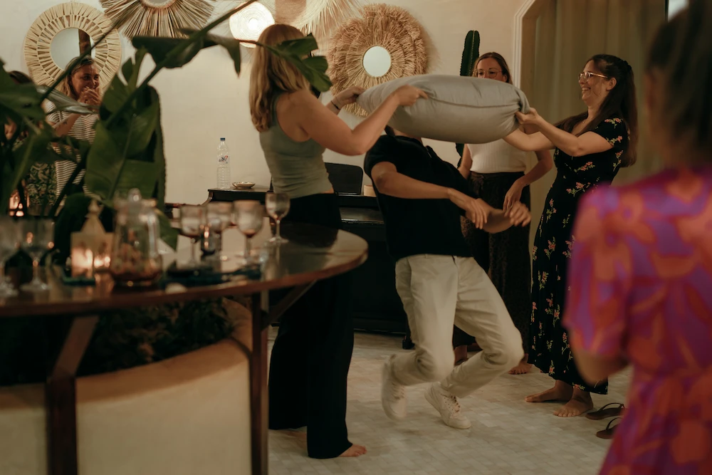 Indoor Party Game at Yogi Surfer Villa at The Yogi Surfer in Taghazout Bay, Morocco.