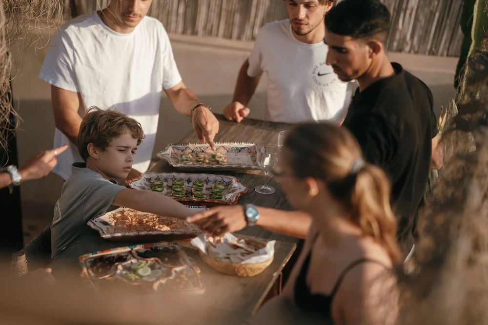 Surf Camp Terrace Food Sharing at The Yogi Surfer in Taghazout Bay, Morocco.