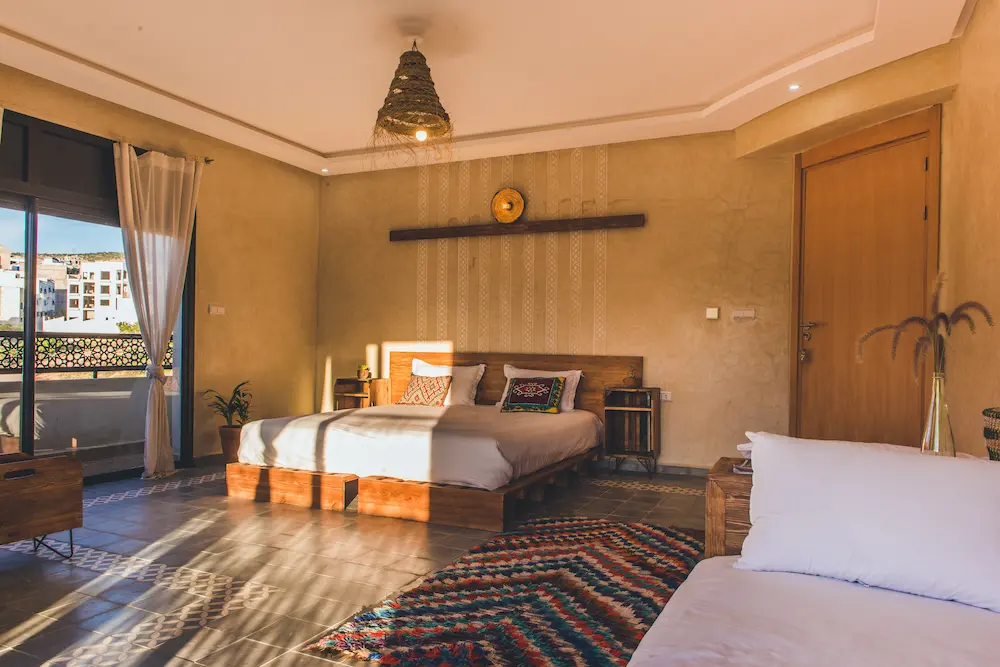The Deluxe Ocean Suite, with the bed and seating area