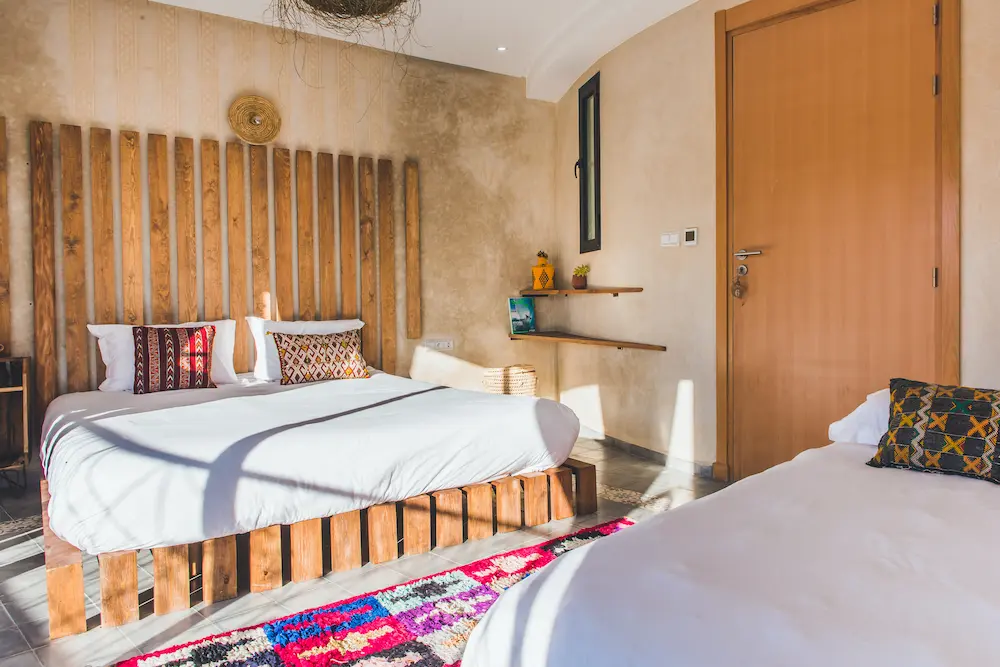 Two of the three beds in the triple sea-view room
