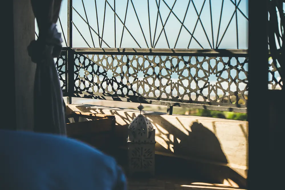 The private balcony of a double ocean-view room, looking over Taghazout Bay