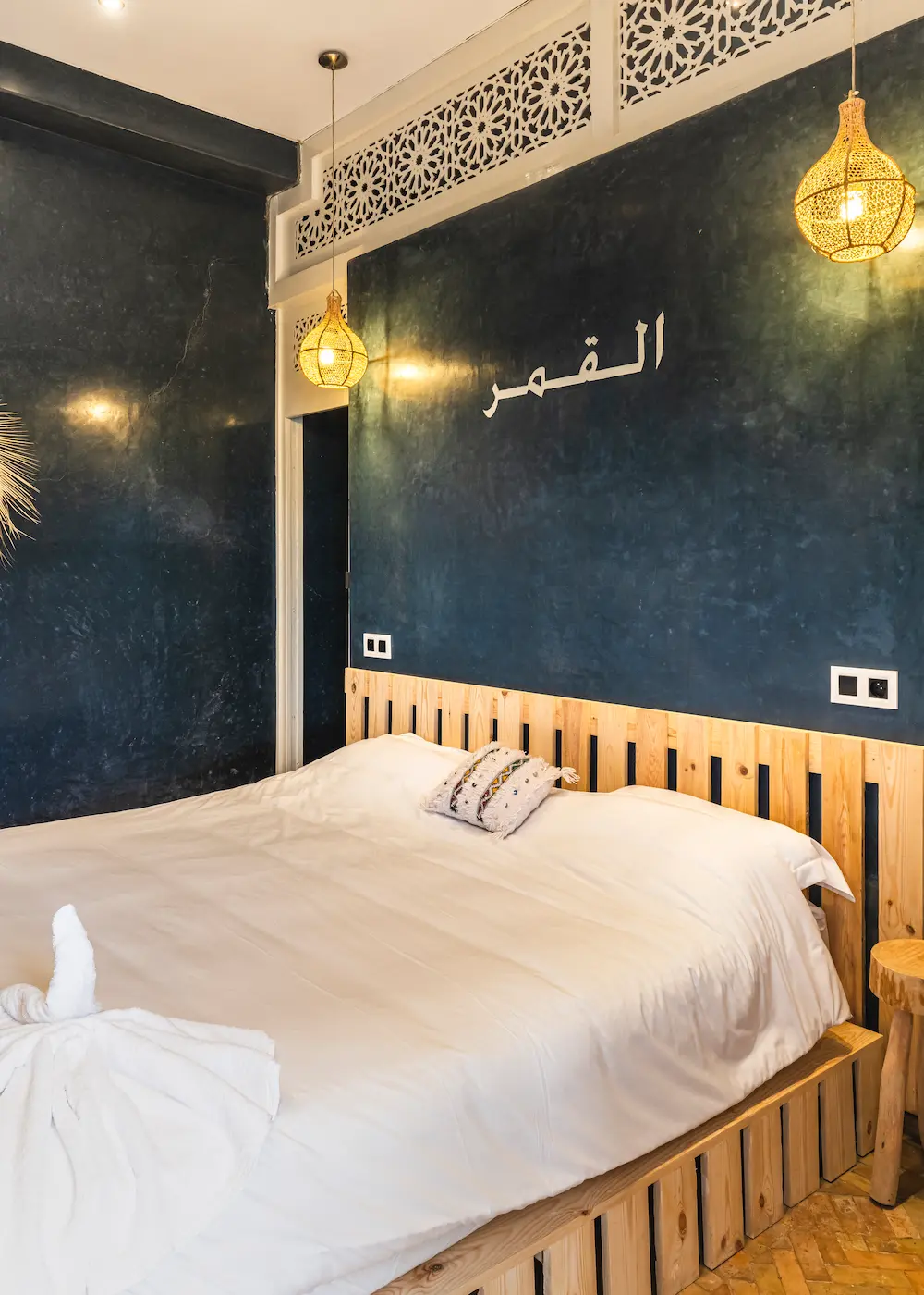 The double bed in the Moon Room, made up with white linen