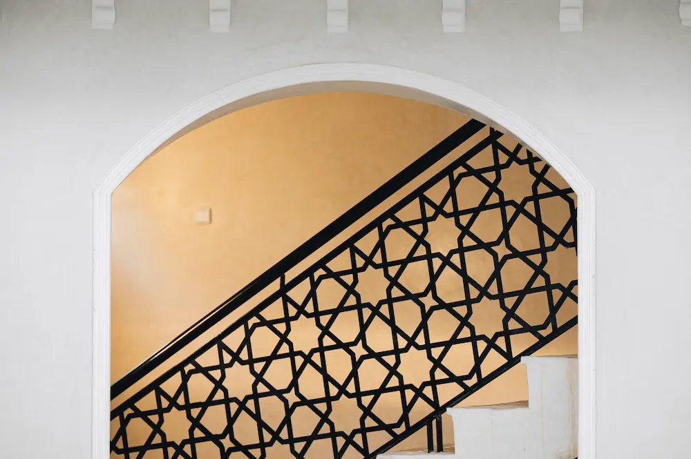 The tiled interior staircase between floors