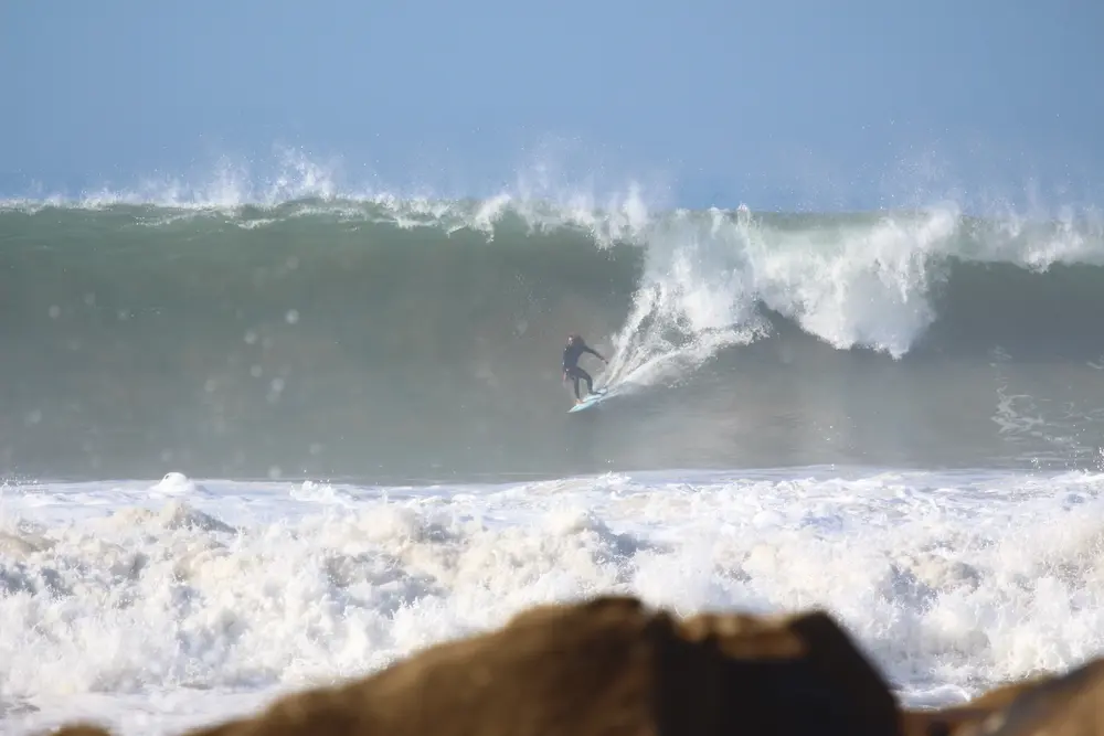 Surf Guide Big Wave at The Yogi Surfer in Taghazout Bay, Morocco.